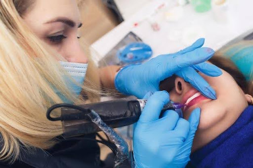 Lip tattooing for cosmetic purposes